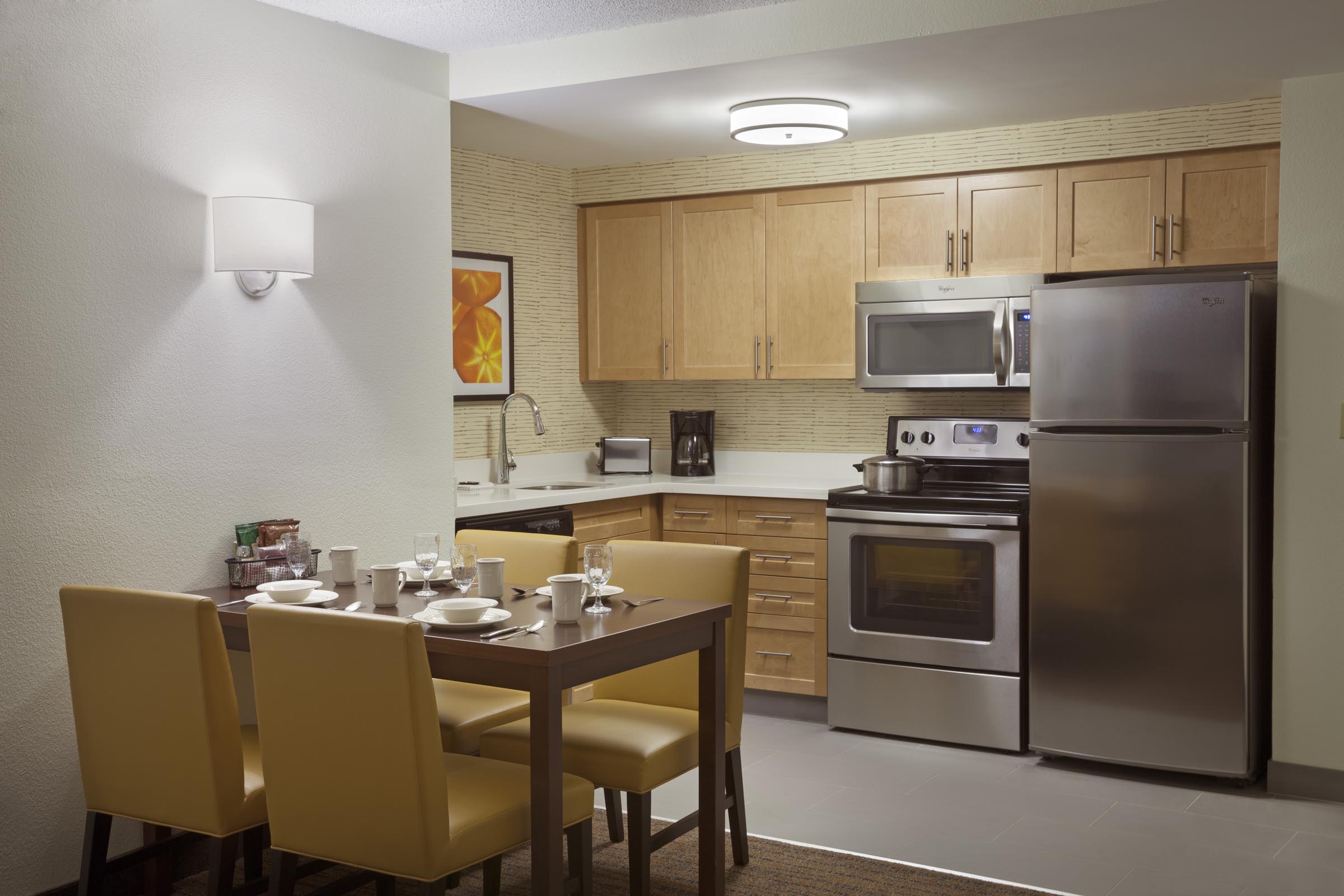 Full Kitchen With Seating Area For Four People And Oven   Cambride Suites Mississauga Two Bedroom Kitchen 